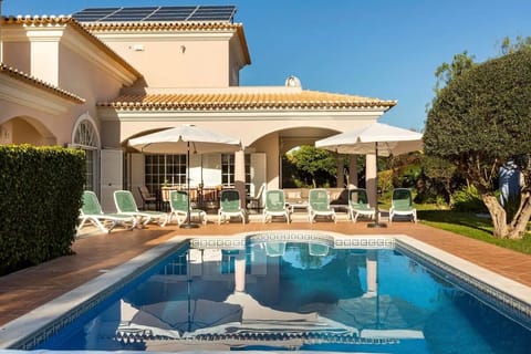 Front of the house with pool view
