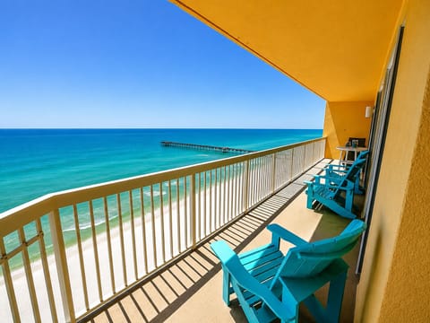 Sip your morning coffee on your private balcony while watching waves roll onto pristine sand below.