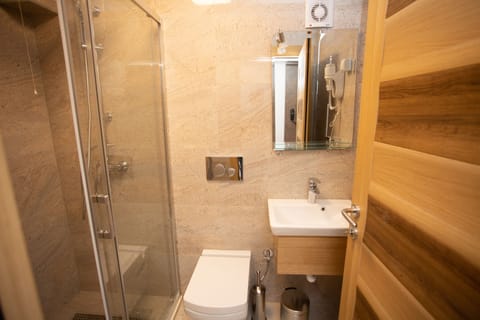 Comfort Single Room | Bathroom | Free toiletries, hair dryer, slippers, towels