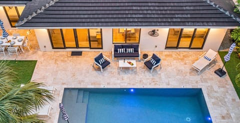 Relish the serenity of this most sought-after neighborhoods a short 10-minute walk or 2-minute golf cart ride to the beach.
