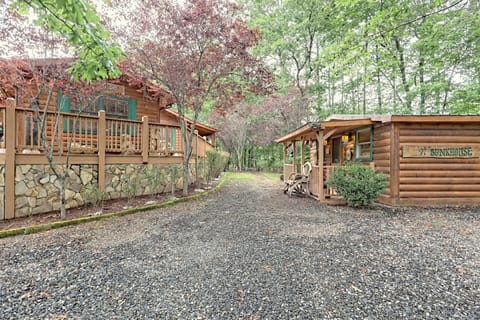 The Bunkhouse is the rental cabin on the right next to the Main Cabin.