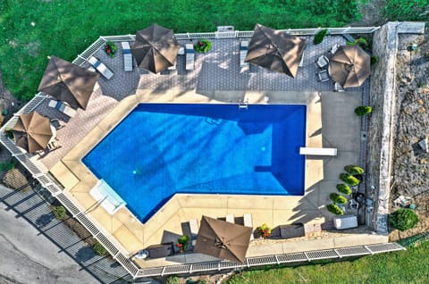 Quittie Glen Pool From above - 16 Chaise Lounge and 2 Large Tables - 8 seats each - total seating of 32