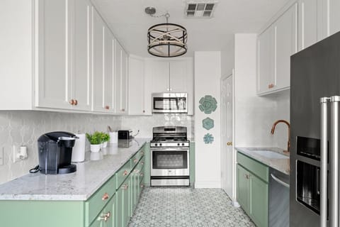 Newly renovated kitchen with modern appliances including dishwasher 