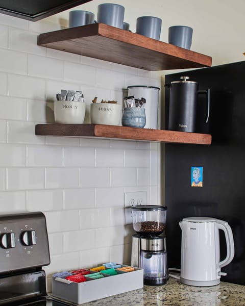 Help yourself to our complimentary collection of teas and  locally-roasted coffee. A burr grinder and french press are provided to help you make the perfect cup of coffee.