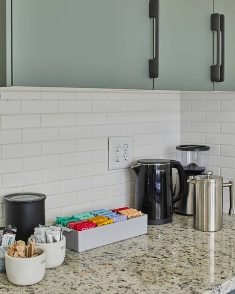 Help yourself to our complimentary selection of teas and locally-roasted coffee. We provide a burr grinder and a french press to help make a delicious cup of coffee.