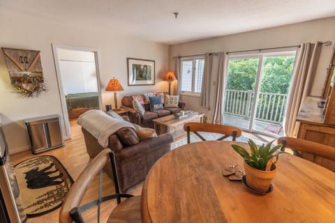 Living / Dining area with view of balcony