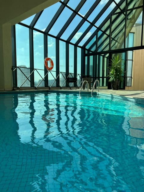 Indoor pool, sun loungers