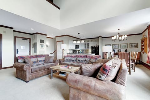 - Spacious open living room with plush lodge-style seating   - Mountain-inspired design with warm tones and cabin comfort   - Perfect for relaxing evenings after skiing Stratton Mountain