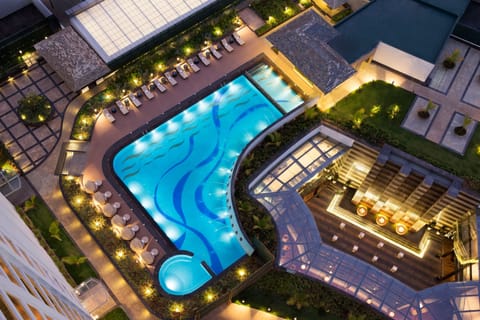 Outdoor pool, open 6:00 AM to 8:00 PM, sun loungers