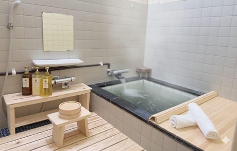 Yuzawa Toyo | Bathroom | Combined shower/tub, free toiletries, hair dryer, electronic bidet