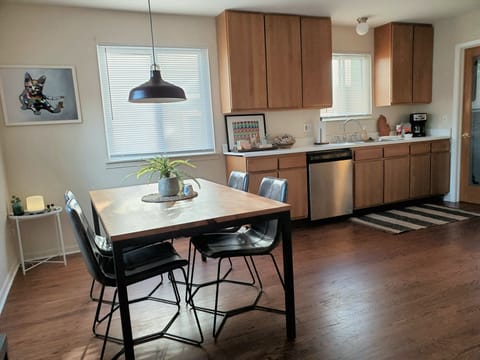 Kitchen stocked for cooking, serving, dining, and a dishwasher for clean-up!