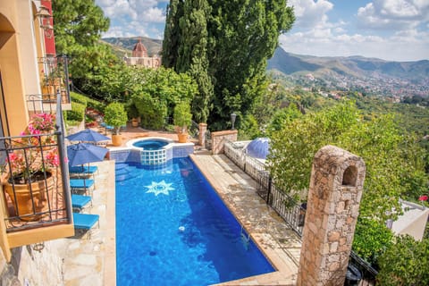 Outdoor pool, open 8:00 AM to 8:00 PM, pool umbrellas, sun loungers