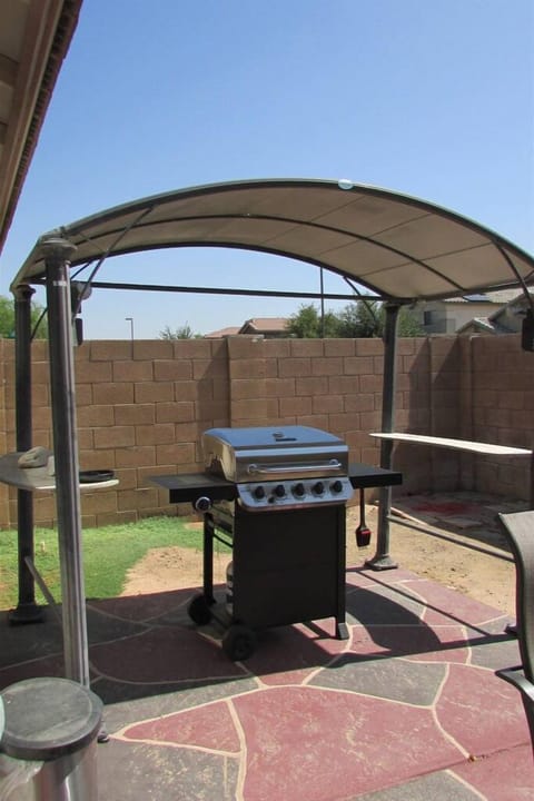 Private backyard with swimming pool, BBQ, and outdoor patio