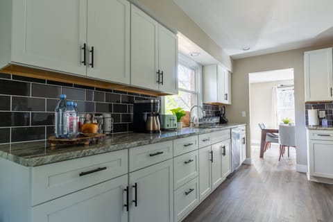 Gourmet chef's kitchen, top of the line appliances, gas stove with all cookware