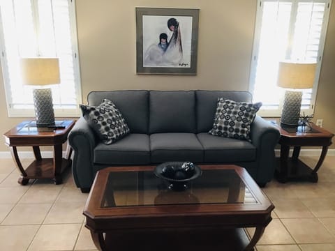 Relax on the sofa in the comfortable living room.