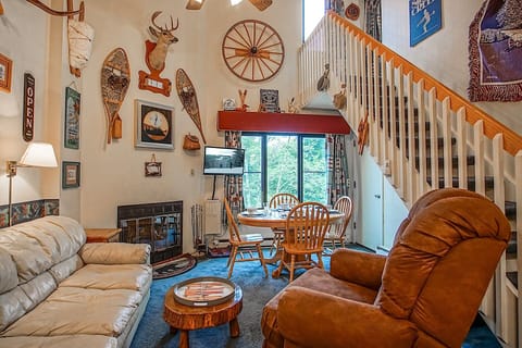 Living room with wood burning fireplace