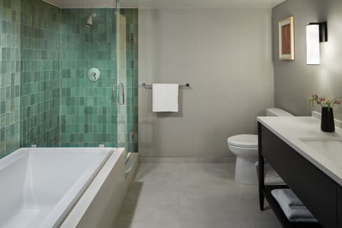 Room, 1 King Bed, Corner (Spa) | Bathroom | Designer toiletries, hair dryer, bathrobes, slippers