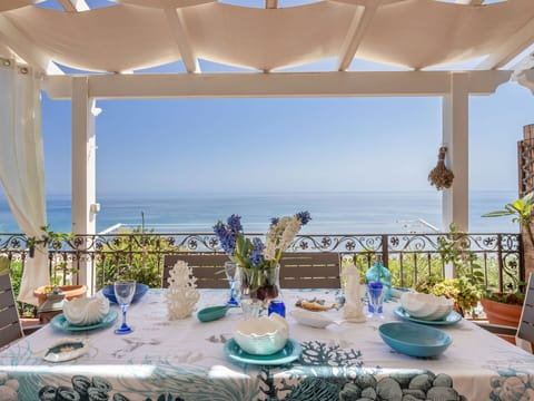 Table, Tableware, Property, Water, Sky, Furniture, Azure, Dishware, Building, Interior Design