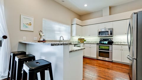 Pull up a seat and savor the moments in our modern kitchen.