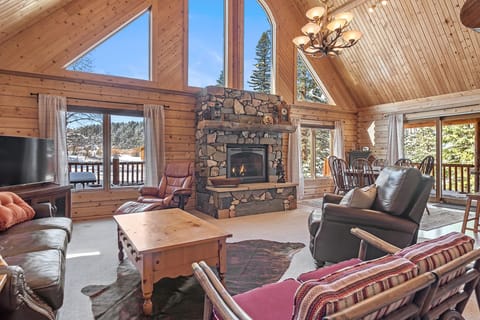 Two story sun drenched great room with spectacular views