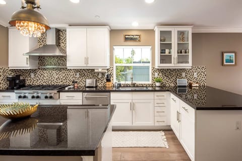 Natural daylight floods the spacious kitchen making food preparations all the more enjoyable.