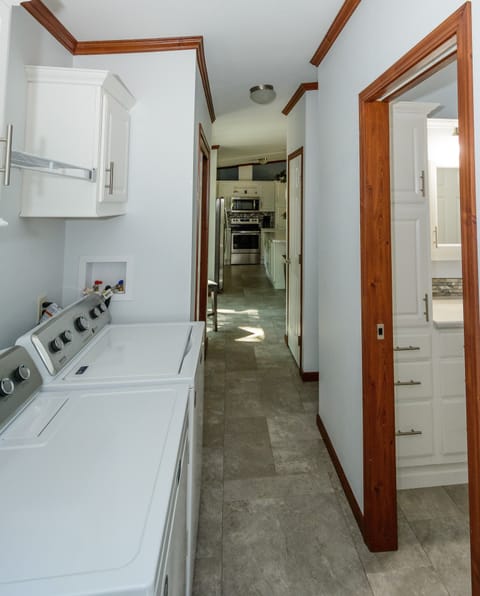 Washer/Dryer for your convenience. Three closets in this hallway