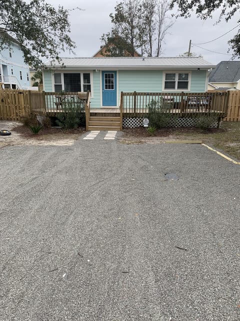 Bungalow 1 block from the beach.  Room for 2-3 cars and even a boat trailer. 