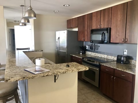 Beautifully updated kitchen, fully stocked with all the items, coffee, pots, etc