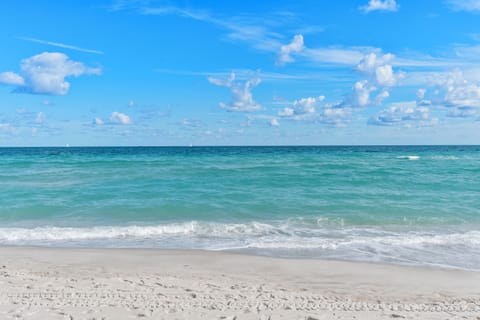 On the beach, white sand