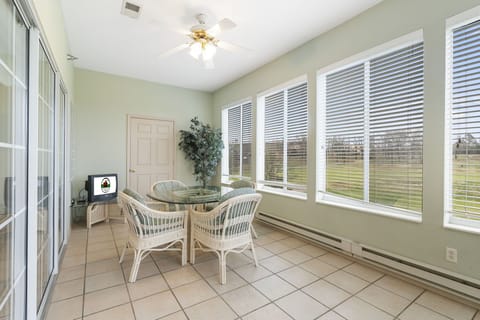 All-Season Sunroom with Course View