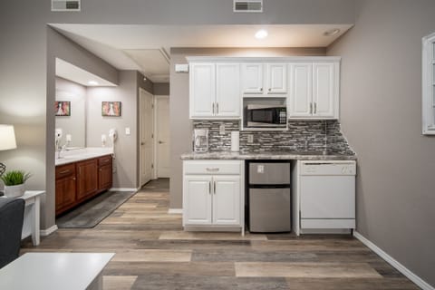 Kitchenette with Mini-Fridge, Dishwasher, and Microwave