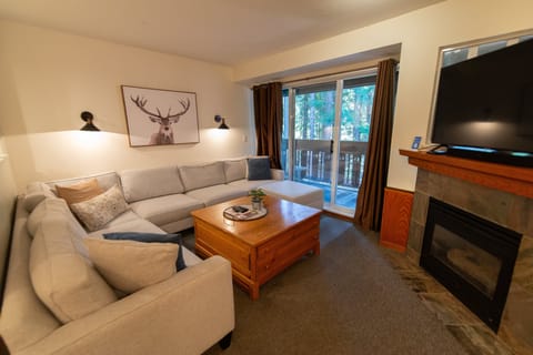 Open plan living area with large sofa