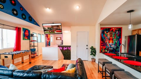 Kick back and play! Our ultimate lounge setup combines entertainment and relaxation seamlessly. From foosball frenzy to TV tranquility, every angle spells fun. 🛋️📺⚽ #LoungeLife #GameOn