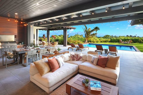 Another seating area with modern space and unobstructed sightlines to the pool and beyond.