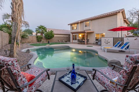 HARVARD CLASSIC is our 4 BR, 2.5 BA, 2 story home with a heated pool, putting green and pool table.