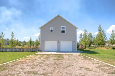 View of the house from the drive way. Garage and on the right is for guests.