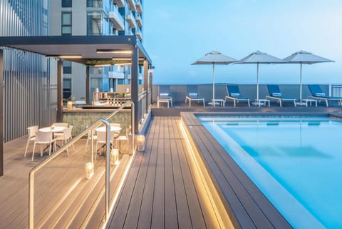 Outdoor pool, open 9:00 AM to 6:00 PM, pool umbrellas, sun loungers