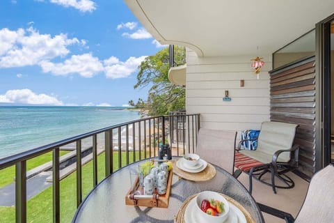 Enjoy alfresco dining with breathtaking views of the turquoise waters right from your balcony