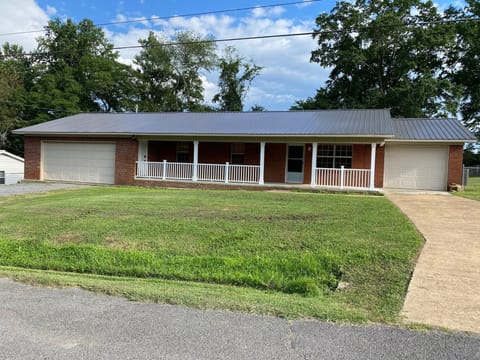 Front View - 2 boat garage on left, 1 boat garage on right