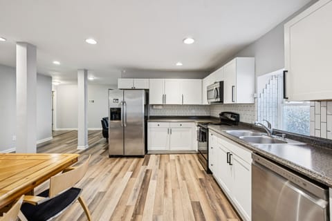 The lower floor has a fully stocked kitchen