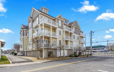 Spacious coastal-style condo with private balconies and covered parking