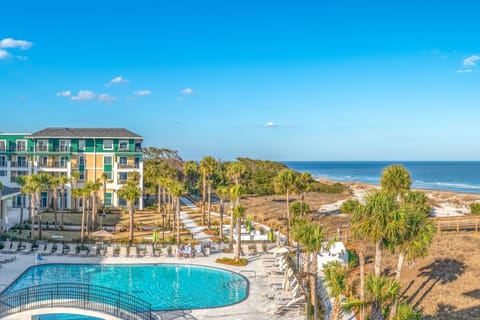 Outdoor pool, open 9:00 AM to 10:00 PM, pool umbrellas, sun loungers