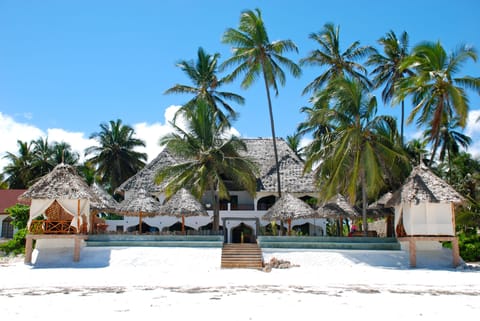 Private beach, white sand, sun loungers, beach umbrellas