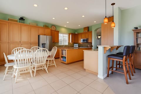 Bright and welcoming kitchen with plenty of room to cook, gather, and enjoy meals together.