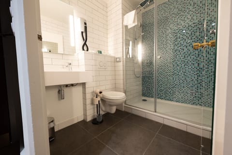 Eco-friendly toiletries, hair dryer, towels