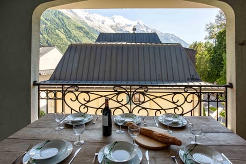 Lovely balcony terrace with table and chairs