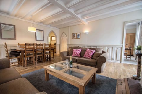 Open-plan living room with arched doorways