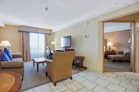 Executive Suite, 1 King Bed, Non Smoking | Desk, laptop workspace, blackout drapes, iron/ironing board