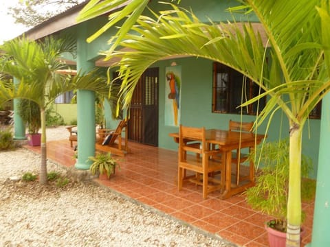 Step out to a spacious covered patio for out door tropical dining. 