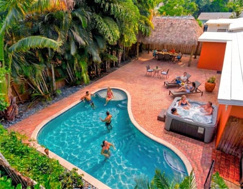 Enjoy the comfort of your private saltwater pool, an outdoor shower, and a beautifully shaded tiki hut made for dining, laughter, and slow evenings.